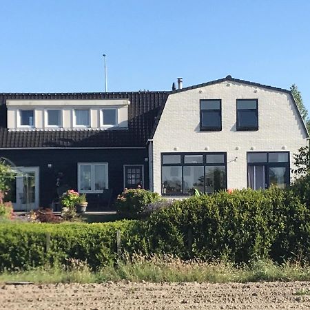 T Huuske Tuinappartement Met Fantastisch Uitzicht, Nabij Zee Zonnemaire Экстерьер фото