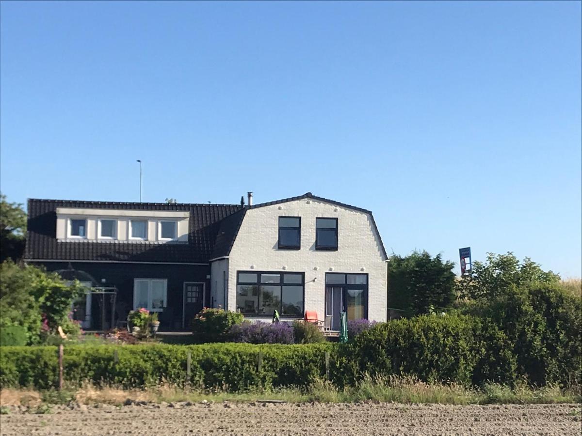 T Huuske Tuinappartement Met Fantastisch Uitzicht, Nabij Zee Zonnemaire Экстерьер фото